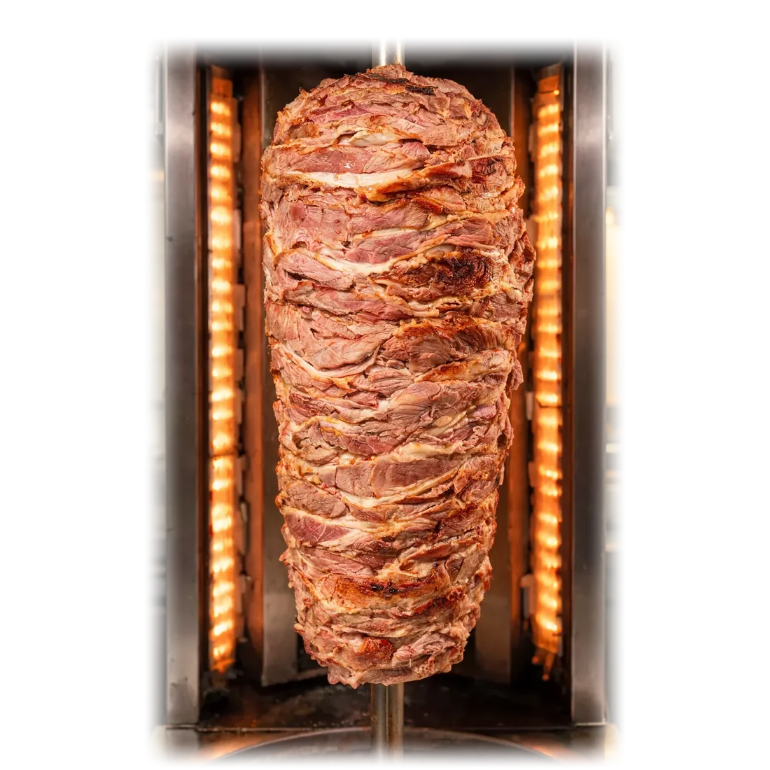 Mięso na kebab SiyamisMeat na rożnie w rozgrzanym opiekaczu